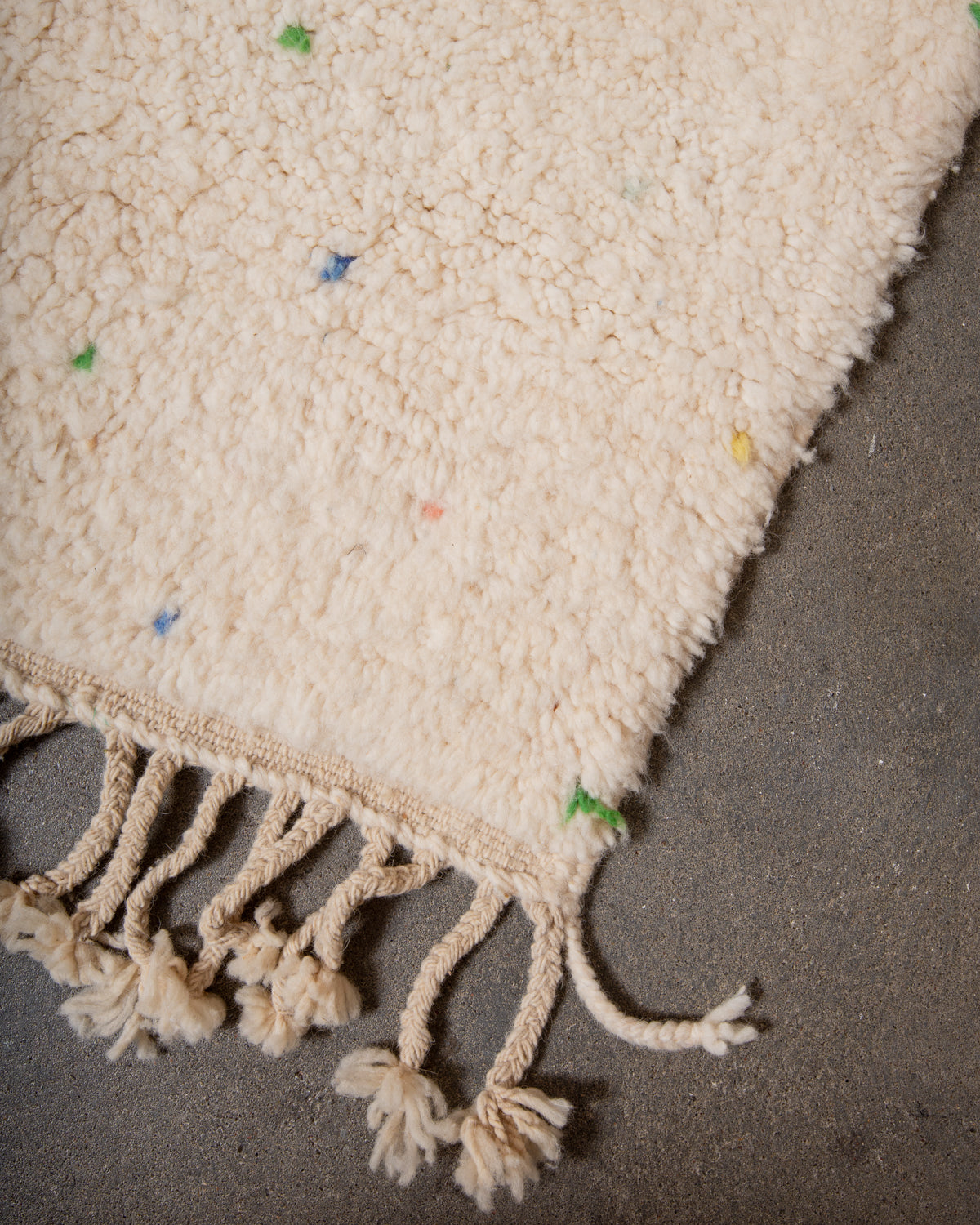 Modern, designer, handcrafted Berber rug from Morocco. Beniourain carpet with beautiful colours and patterns and fluffy wool texture.